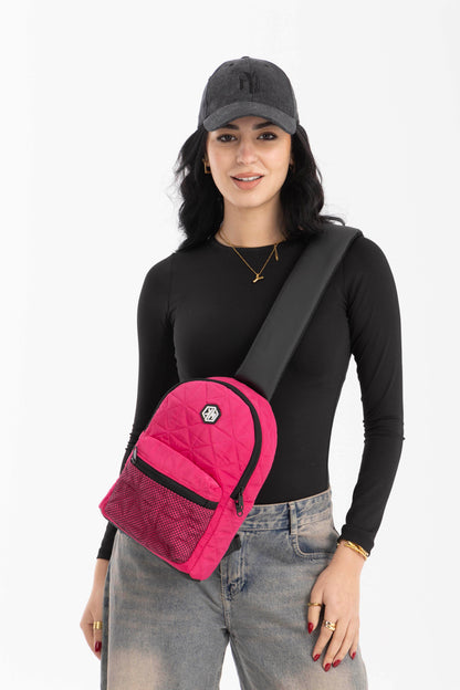Travel Mate Crossbody Sling Backpack – Pink by KM Signee – compact quilted crossbody bag, image 1 of 7